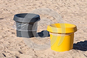 Garbage containers on the sea beach