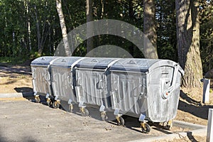 garbage containers on the site in the city park