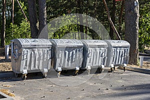 garbage containers on the site in the city park