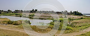 Garbage in countryside, Wat Hanchey, Mekong River, Cambodia