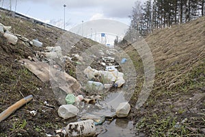 Trash in a roadside ditch