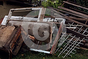 Garbage dump in the green forest, close-up