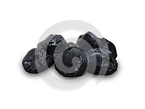 A garbage dump with a large and black plastic bag isolated on white background