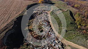 Garbage dump with plastic bags and food waste. Recycling of waste. Arial view of the dispose rubbish in landfill. Trash