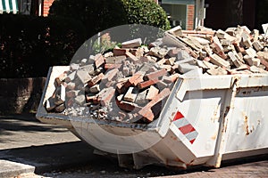 Garbage Dumpster near a construction site