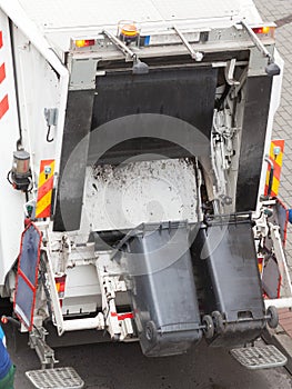 Garbage dustcart truck on city street