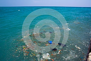 Garbage floats in the sea. An island of man-made garbage in the sea