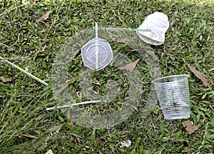 Garbage on the ground. Plastic cup trash.World ecology problem