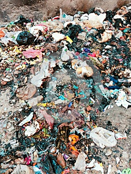 Garbage heap waste garbage-pile trash rubbish dump litter dirty solid-rubbish scrap refuse plasticbags landfill photo photo