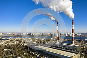 Garbage incineration plant. Waste incinerator plant with smoking smokestack. The problem of environmental pollution by