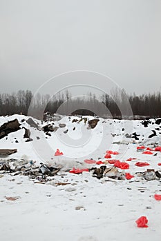 Garbage on the landfill in winter