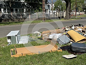 Garbage next to the road in the city