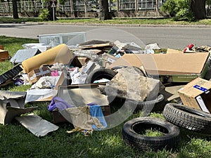 Garbage next to the road in the city