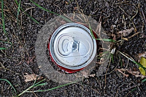 Garbage from one round white aluminum can