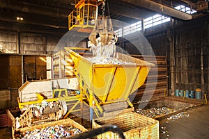 Garbage pile getting sorted for recycling of materials