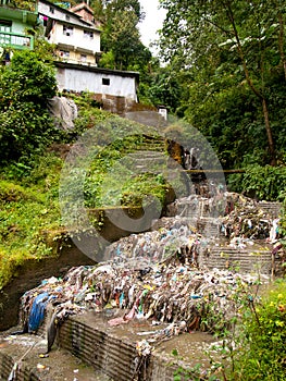 Garbage and rubbish polluting the water in Darjeeling photo