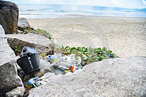 Garbage in the sea with bag plastic bottle and other garbage beach sandy dirty sea on the island - Environmental problem of