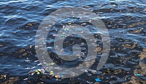 Garbage in sea water. Plastic trash in ocean. Ecological problem. Urban seaside pollution
