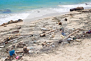Garbage on the seashore. Dirty beach, environmental problem
