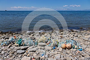 Garbage thrown on the sea shore. Cape Stolbchaty. Cape on the we