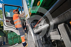 Garbage Truck Driver and City Garbage Collecting