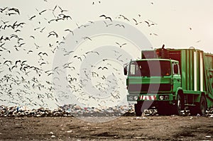 Garbage truck on a landfill