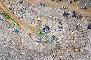 Garbage or waste Mountain or landfill, Aerial view garbage trucks unload garbage to a landfill. Plastic pollution crisis