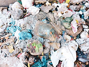 Garbage heap waste garbage-pile trash rubbish dump litter dirty solid-rubbish scrap refuse plasticbags waste-material debris image photo