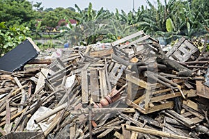 Garbage woods heaping in a landfill