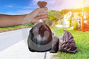 Garbageâ€‹ bagsâ€‹ inâ€‹ handâ€‹ holdingâ€‹