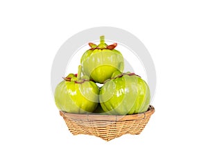 Garcinia cambogia fresh fruit, isolated on white. Fruit for diet