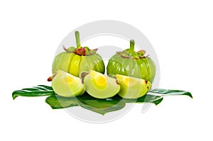 Garcinia cambogia fresh fruit, isolated on white. Fruit for diet photo