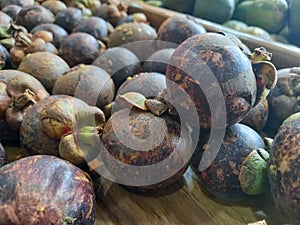 Garcinia mangostana or manggis fruits, tropical fruit with high anti-oxidant photo