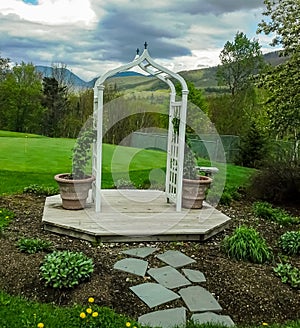 Garden Arbor with Mountain Background