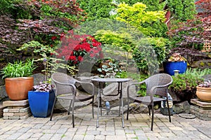 Garden Backyard Landscaping with Bistro Furniture springtime