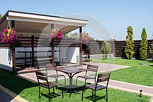 Garden Or Backyard Outdoor Pavilion With Wood Pergola, Bar Counter, Brick Oven, Fireplace And Barbecue For Cookout Food. Summer