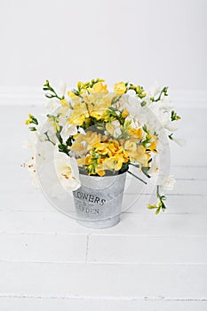 Garden basket with yellow flowers