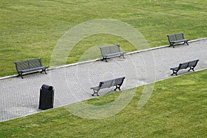 garden benches on a city park