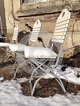 Garden chairs in winter sun