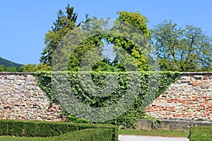 Garden and courtyard in the summer on the site of Red Stone Castle in Slovakia, Europe