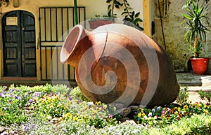 Garden decoration with amphora in Moura photo