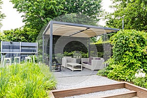 Garden design with metal rooftop and patio