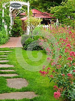 Garden entry with path and flowers