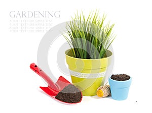 Garden equipment with plant and green plants isolated on white background