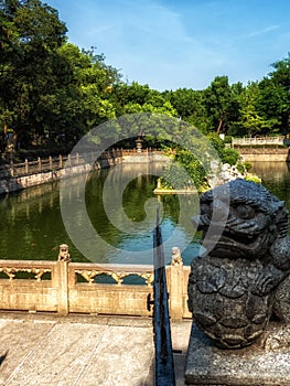 garden with fish pool, stone bridge and pavilions, Hangzhou, China