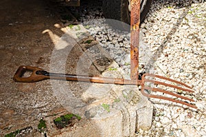 Garden Fork Lying On Pavement