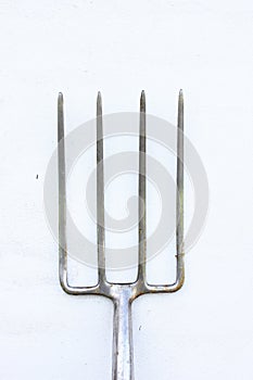 Garden fork on white background
