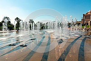 Garden and fountains outdoors of Emirates Palace a luxurious 7 star hotel in Abu Dhabi