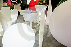 Garden furniture made of plastic. Garden round lamp, fence and outdoor flowerpots