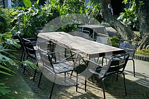Garden furniture with seats and wooden table